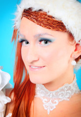 Beautiful ginger in a dress of Snow Queen