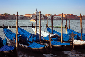 Fototapeta na wymiar pier with the gondolas in Venice