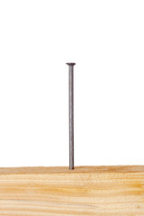 Wooden board with nails