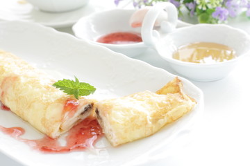 french confectionery, crepe with strawberry sauce and honey