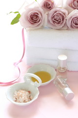 purple roses on white towel