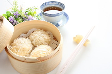 chinese cuisine, Shumai in bamboo steamer for yam cha image