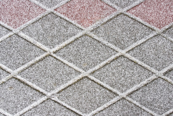 Tile covered with snow