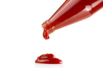 Fototapete Rund Tomato ketchup falling from bottle © Melica