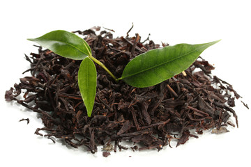 Dry black tea with green leaves, isolated on white