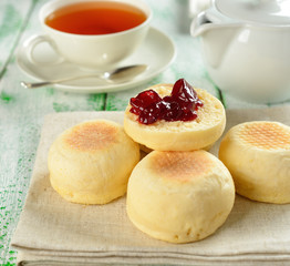 Traditional English muffins on a white table