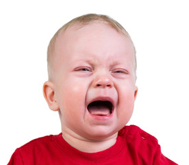Portrait of crying 9-months old baby boy in red t-shirt
