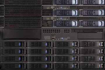 Server Blades and storage in a rack close up