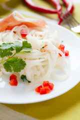 Oriental rice vermicelli on a white plate