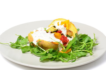 vegetarian dish with potatos sour cream vegetables and cheese