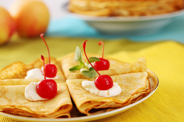 Pancakes with cherries