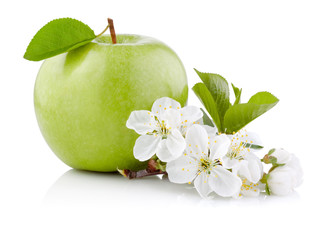 Single Green Apple with Leaf and Flowers isolated on a white bac
