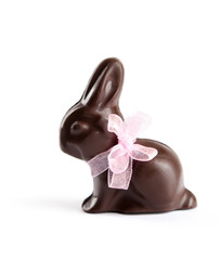Chocolate rabbit with pink ribbon, isolated on white