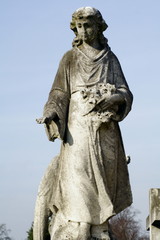 stone angel statue in cemetery