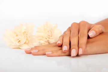 Foto op Plexiglas Woman in a nail salon receiving a manicure © Tomasz Papuga