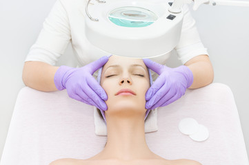 Young woman receiving beauty therapy