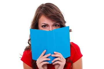 Girl behind colorful book