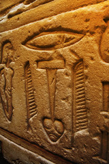 Old egypt hieroglyphs carved on the stone