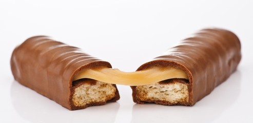 chocolate bar filled with caramel and biscuit; halved