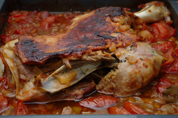 Delicious lamb shoulder with tomatoes and onions