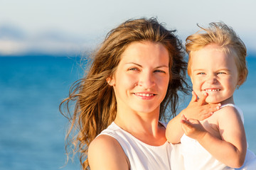 Mother and daughter on the beach