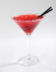 Red cocktail with ice
