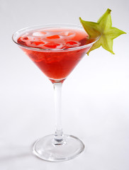 martini cocktail with ice and carom