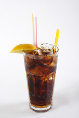Cola in highball glass with lemon slice