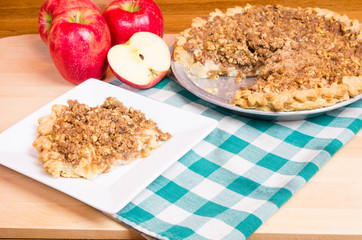 Slice of apple crumb top pie