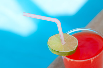 Vibrant Cocktail on pool background