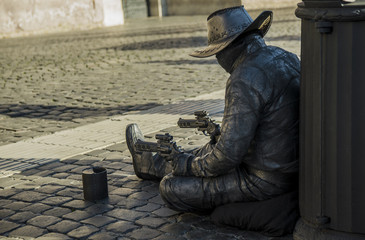 Gunslinger from the future begging