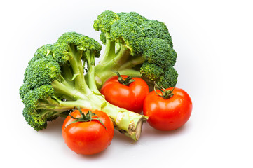 Bbroccoli and tomatoes isolated on white background