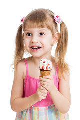 happy child girl eating ice cream in studio isolated © Oksana Kuzmina
