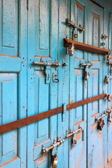 Colorful ancient door with locks