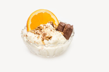 Vanilla ice cream with chocolate and nuts