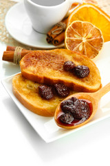 White bread toast with jam and cup of coffee, isolated on white