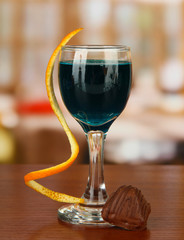 Tasty color liquor, on bright background