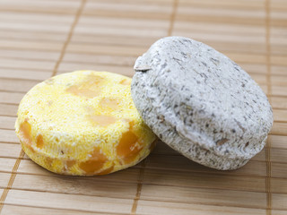 Two soap of different colors