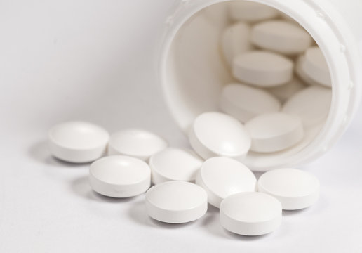White tablets near the box