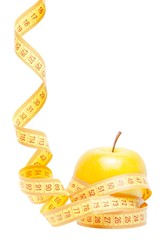 an apple with tape measure and space for text