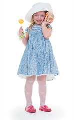 the lovely girl listens to a cockleshell