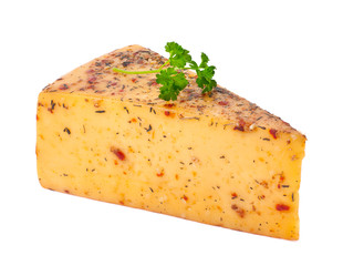 piece of cheese with spices on a white background