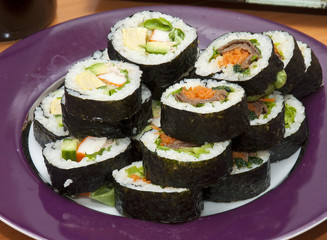 Sushi on a purple plate