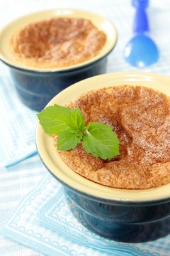 souffle garnished with fresh oranges mint leaf