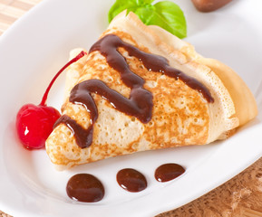 pancakes with chocolate and cherries 