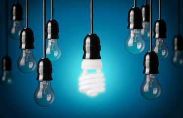 Energy saving and simple light bulbs.Blue background