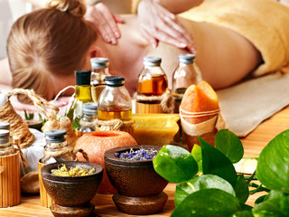 Woman getting massage in luxury spa.