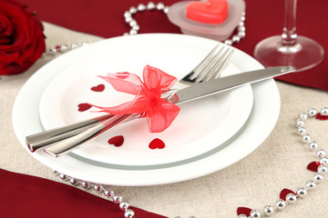 Table setting in honor of Valentine's Day close-up