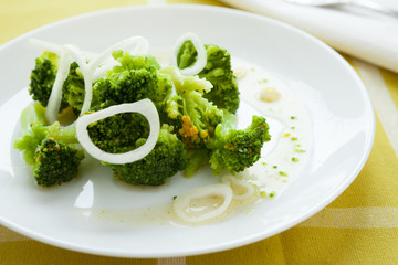Boiled broccoli on the white dish