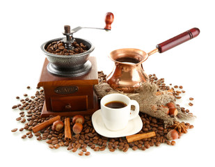 Cup and pot of coffee and coffee beans, isolated on white